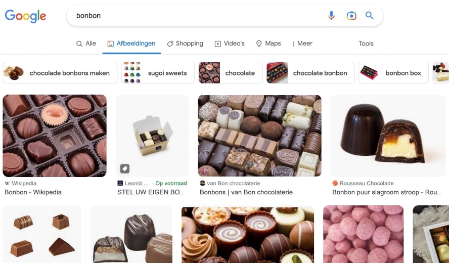 Hier sieht man, dass für den Begriff Bonbon Pralinen bei Google Bildersuche in den Niederlanden angezeigt werden. 
